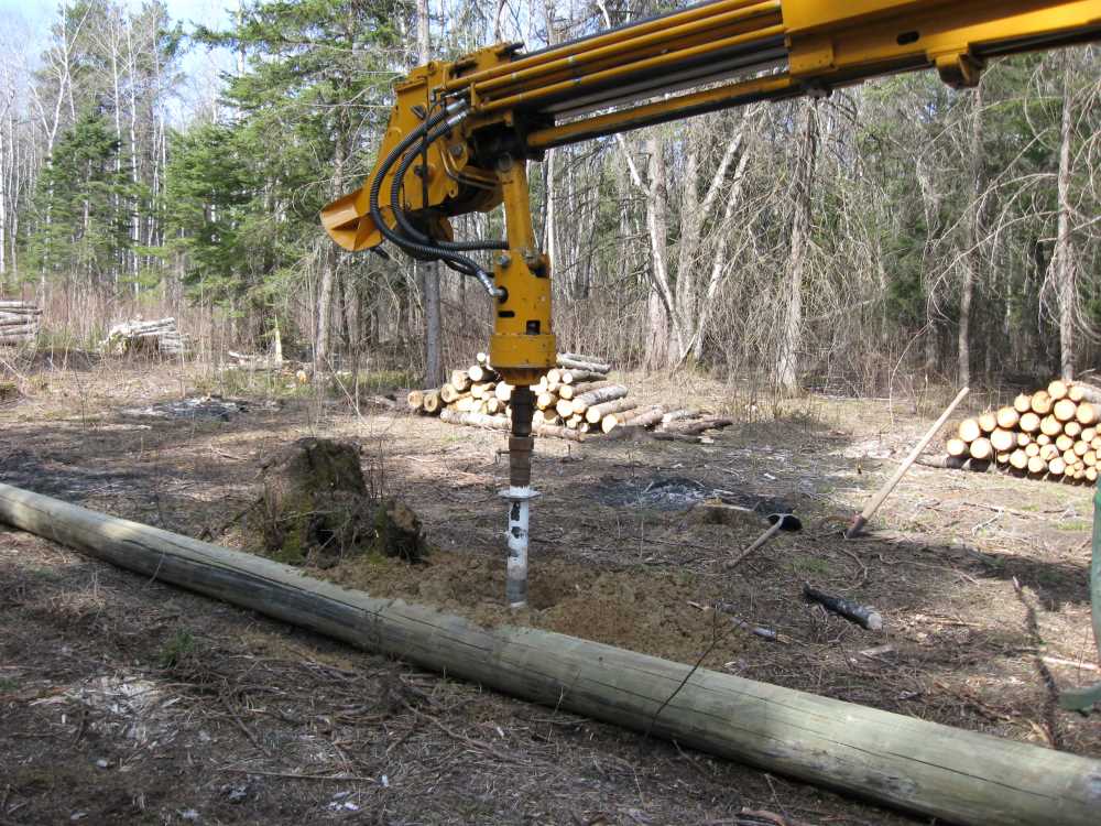 Naturist Legacy History: Gallery 08/05...Hydro installs power line poles