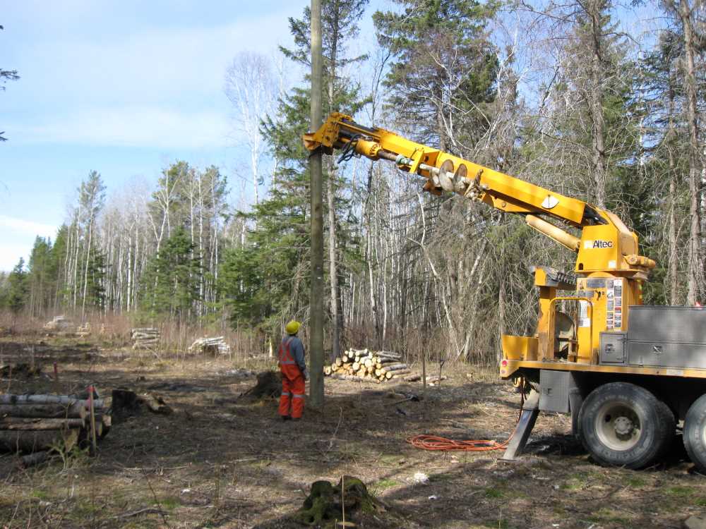 Naturist Legacy History: Gallery 08/10...Hydro installs power line poles