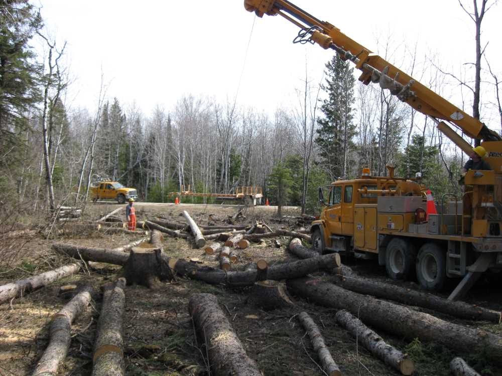 Naturist Legacy History: Gallery 08/16...Hydro installs power line poles