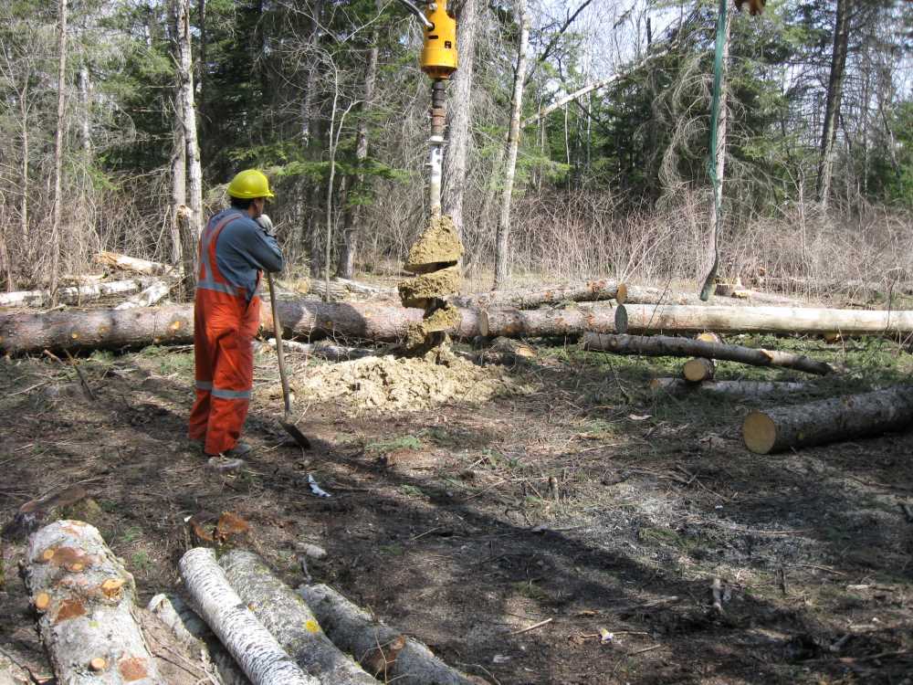 Naturist Legacy History: Gallery 08/18...Hydro installs power line poles