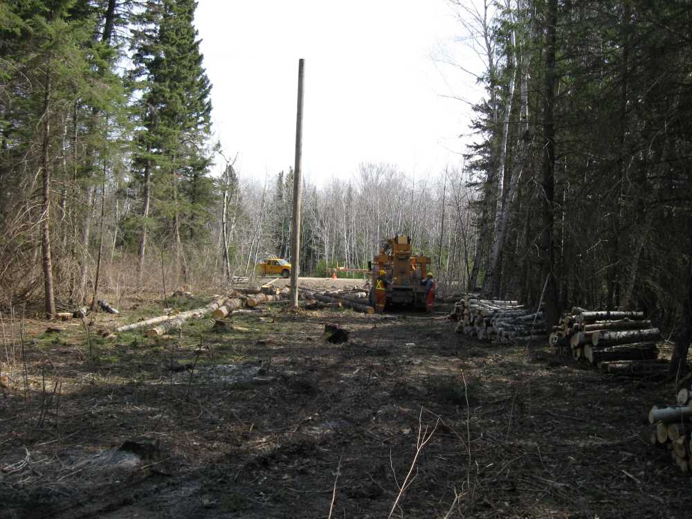 Naturist Legacy History: Gallery 08/23...Hydro installs power line poles