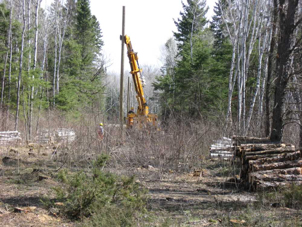 Naturist Legacy History: Gallery 08/26...Hydro installs power line poles