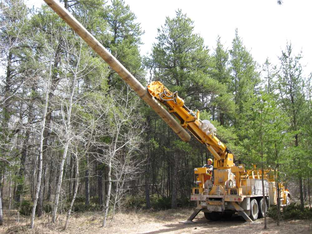Naturist Legacy History: Gallery 08/27...Hydro installs power line poles