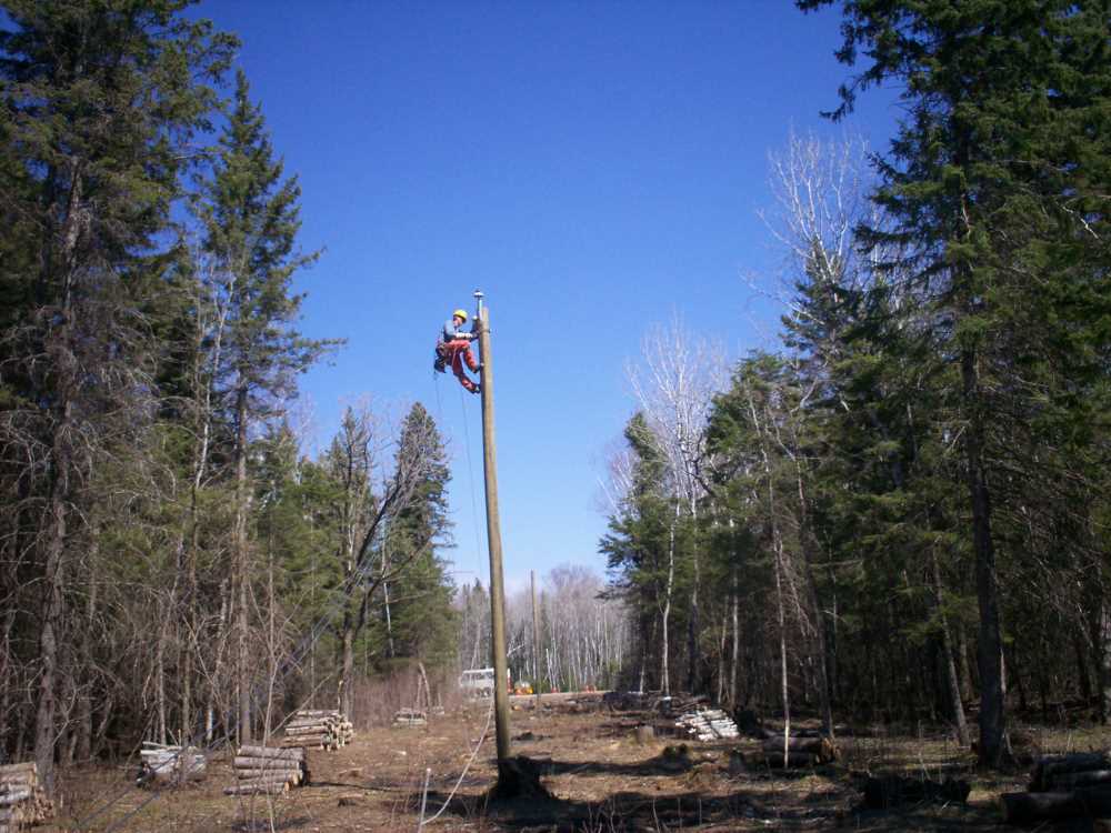 Naturist Legacy History: Gallery 09/05...Hydro installs wires and a transformer