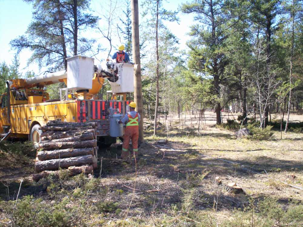 Naturist Legacy History: Gallery 09/11...Hydro installs wires and a transformer