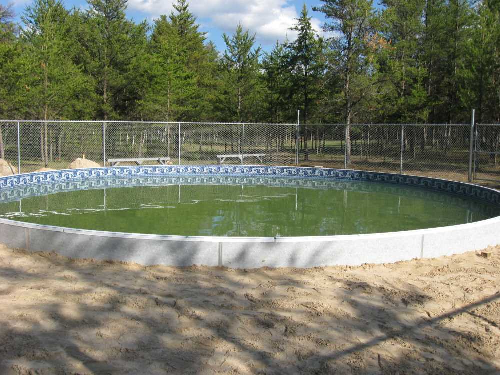 Naturist Legacy History: Gallery 27/17...Work continues on the swimming pool