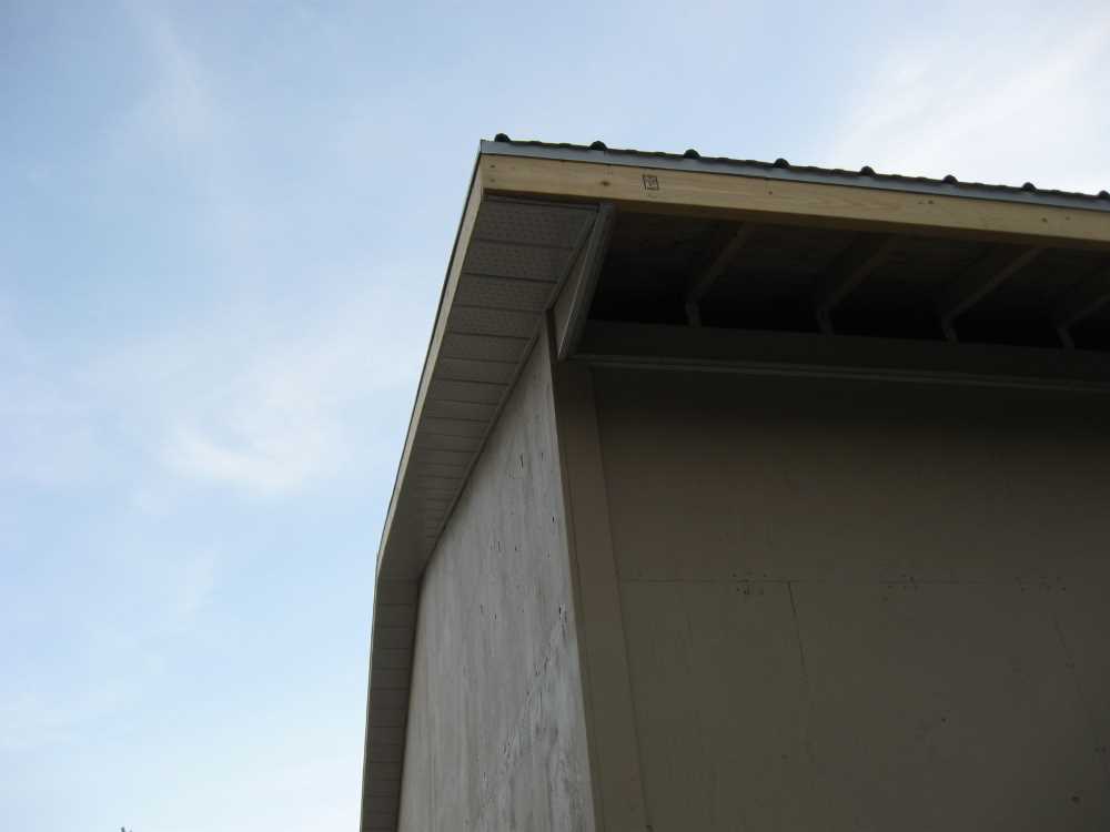 Naturist Legacy History: Gallery 44/11...Doors, windows, soffit installed