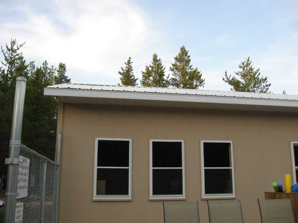 Naturist Legacy History: Gallery 44/18...Doors, windows, soffit installed